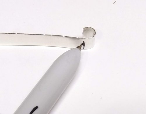 Judy Larson's Make a Hidden Bail - , Metalwork, Butane Torch, Soldering, Solder, Remove the shaped strip from the pliers.